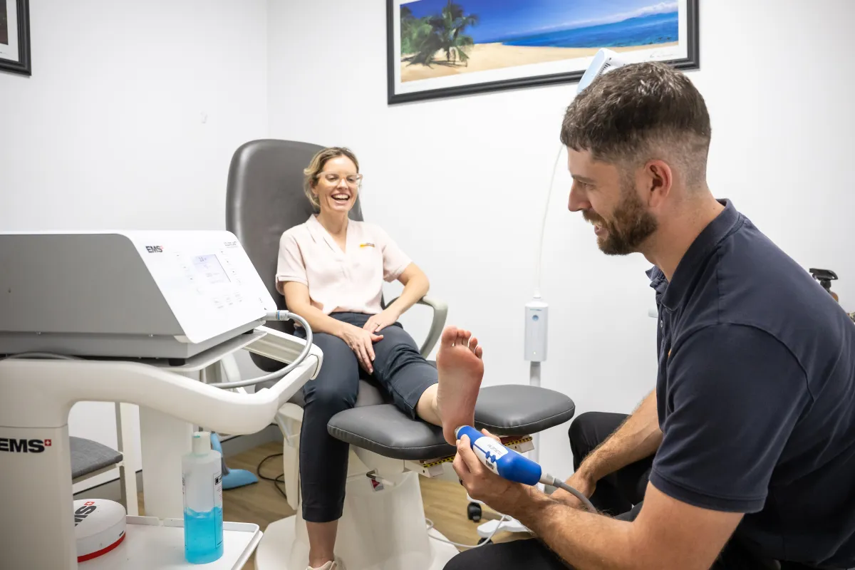 Bli Bli podiatrist providing shockwave therapy for a patient